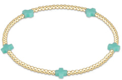 E Newton egirl Signature Cross Small Gold Pattern 2mm Bead Bracelet